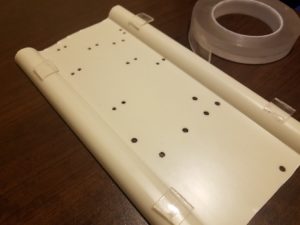 Plastic mounting board with nano gel double-stick tape